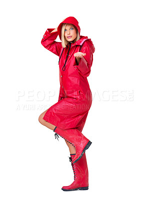 Buy stock photo Winter, waterproof and portrait of a woman with a raincoat isolated on a white background in studio. Insurance, happy and model with clothes for rain, boots and prepared for bad weather on a backdrop