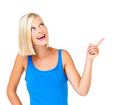 Buy stock photo Happy, pointing and isolated with woman and mockup for promotion, branding of advertising. Smile, offer and vision with face of customer on white background studio for presentation, choice of product