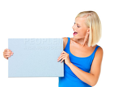 Buy stock photo Mockup, sale and woman looking at poster advertising, marketing and billboard for logo, deal or giveaway. Paper, blonde and female showing brand on a board isolated in a studio white background