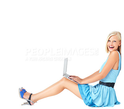 Buy stock photo Portrait, laptop and woman on studio floor, happy and excited on white background space. Face, relax and online, internet or search by casual, smile and cheerful model typing, sitting and isolated