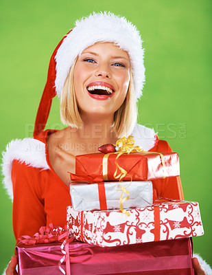 Buy stock photo Woman, face and christmas gift, celebration and festive holiday, portrait and green mockup studio background. Xmas, santa costume and happy model, box and present with smile, studio and happiness