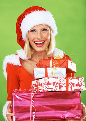 Buy stock photo Woman, Christmas and gift in studio for smile celebration, happiness or festive season giving. Female person, face and portrait for presents or happy holiday winter break, vacation or surprise parcel