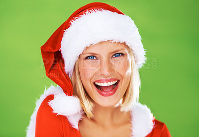 Buy stock photo Woman, Christmas hat and celebration in studio for season holiday, vacation happiness or fun fashion. Female person, smile and portrait in red costume or green background, winter break joy or excited