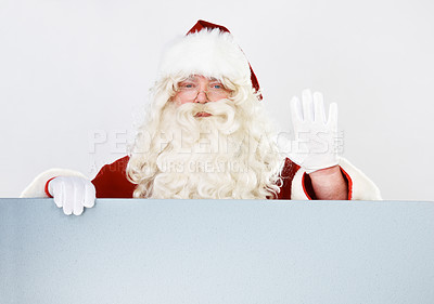 Buy stock photo Christmas, santa and portrait with hand wave for friendly festive holiday greeting advertising. Celebration, vacation and santa claus man waving hello with white studio marketing mockup background.
