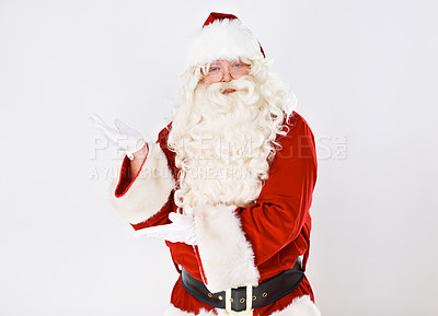 Buy stock photo Santa claus, hand and space for Christmas gift, festive season or holiday celebration. Male person, portrait and palm open on white background for vacation winter break, presenting or studio mockup