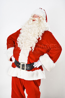 Buy stock photo Santa claus, laugh and in studio for Christmas holiday, festive season or celebration joy. Male person, red outfit and funny on white background mockup for greetings fun, vacation or winter break