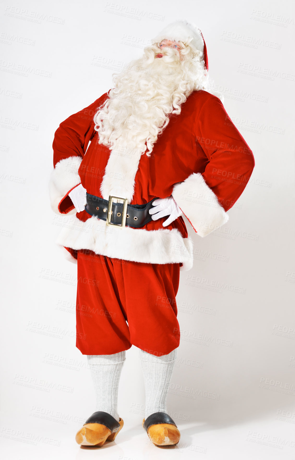 Buy stock photo Christmas, holiday and santa man in suit for festive, happy and cheerful celebration marketing. Traditional santa claus full body with studio mockup and white background for advertising.

