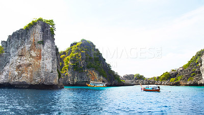 Buy stock photo Panoramic view of beautiful islands with rocky cliffs, boats passing by - Copyspace