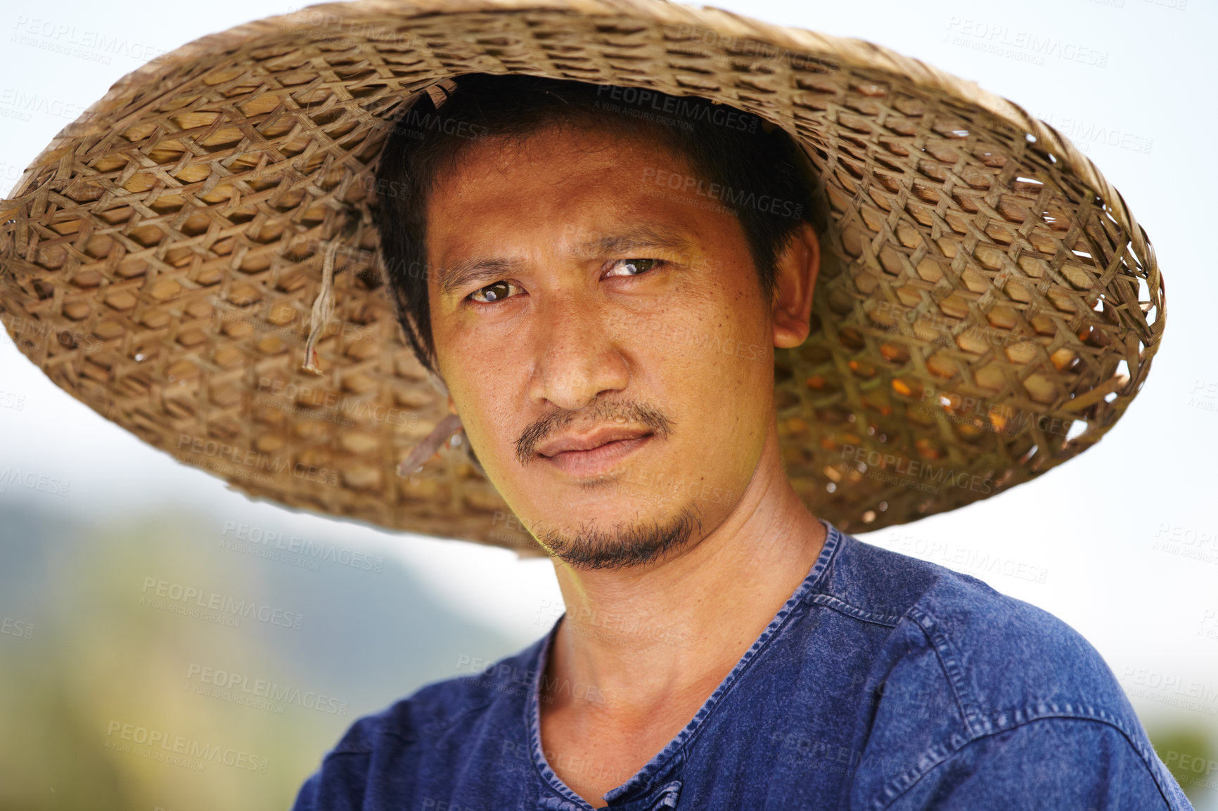 Buy stock photo Asian man, portrait and straw hat in farming, wheat or agriculture in outdoor nature. Closeup face of male person or Thai on farm in plantation, harvest or natural sustainability on countryside land