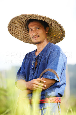 Buy stock photo Asian man, portrait and straw hat in farming, agriculture or wheat on rice field in outdoor nature. Male person or Thai on farm in plantation, harvest or natural sustainability on land in countryside