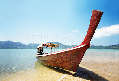 Buy stock photo Traditional Thai long tail boat on the beach - Thailand