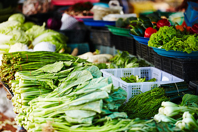 Buy stock photo A stall in a Thai fresh food market packed with fresh, green vegetables