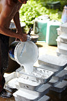 Man pouring rubber - Thailand