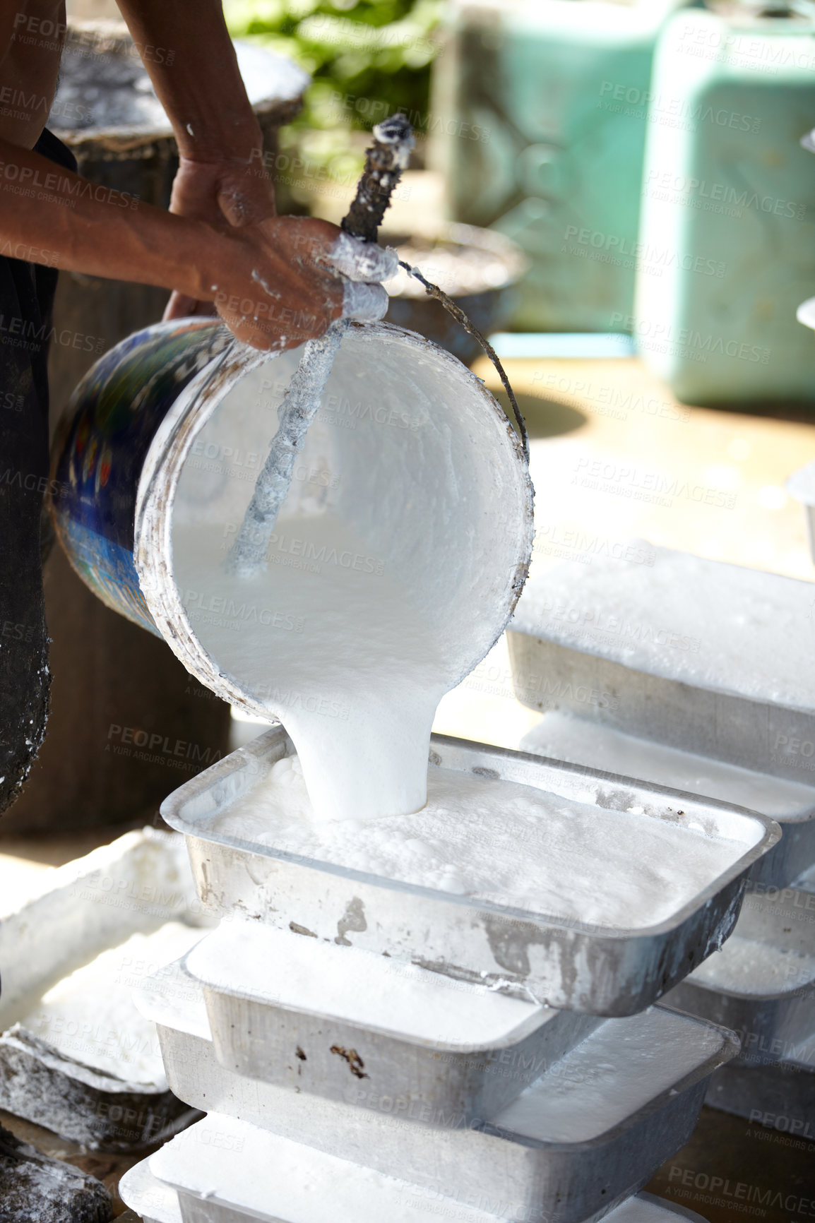 Buy stock photo Rubber, agriculture and person with container in workshop, factory and production warehouse. Plantation, farming and worker with bucket for latex, plastic and material manufacturing in Thailand