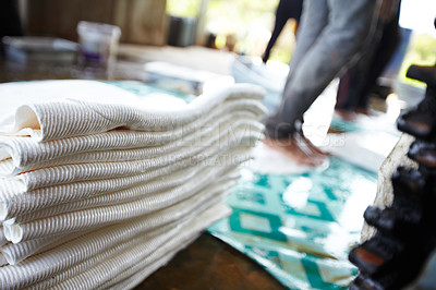 Buy stock photo Rubber sheets in the manufacturing process are pressed flat. A small traditional warehouse making rubber in Thailand. Local trade and craft, made and ethically sourced rubber from the indigenous forests