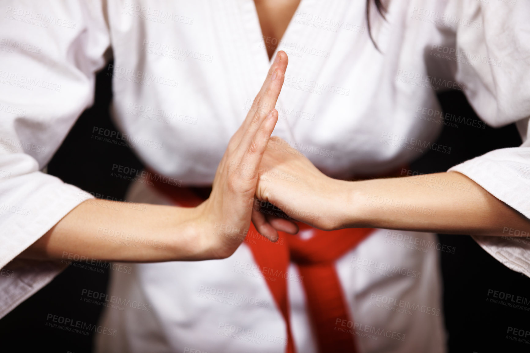 Buy stock photo Studio shot of a woman bowing in her karate gi