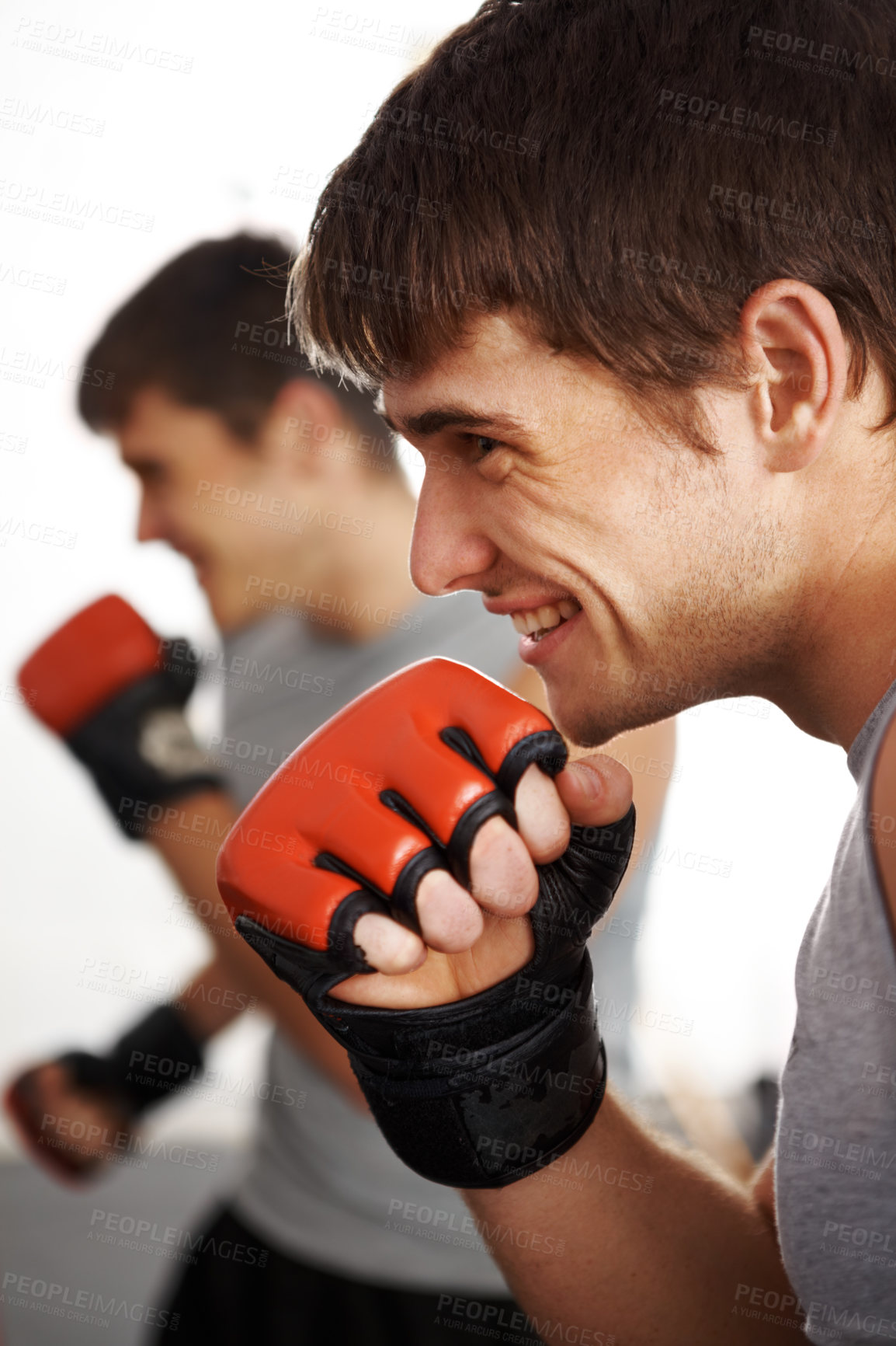 Buy stock photo Man, martial arts and fitness, fist and fight with kickboxing, MMA and battle, power and athlete in gym. Exercise, combat sport and boxing with strong boxer in club, workout and training with glove