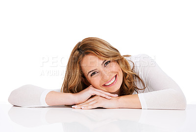 Buy stock photo A stunning young woman lying down upon a white floor and smiling beautifully