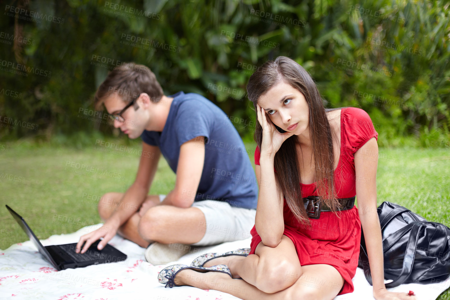 Buy stock photo Couple, conflict and frustrated woman on disaster picnic date with distracted man on laptop in forest. Crisis, fail and annoyed female with workaholic male in park online with social media addiction