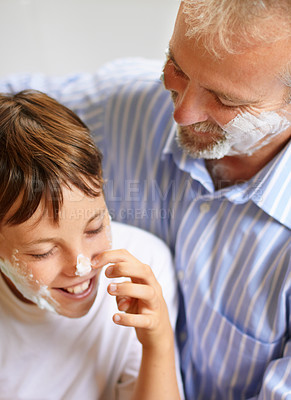 Buy stock photo Father, son and face with shaving cream and smile for grooming for development and learning at home. Happy family, man and child with foam or aftershave for hygiene, lifestyle or parenting with love