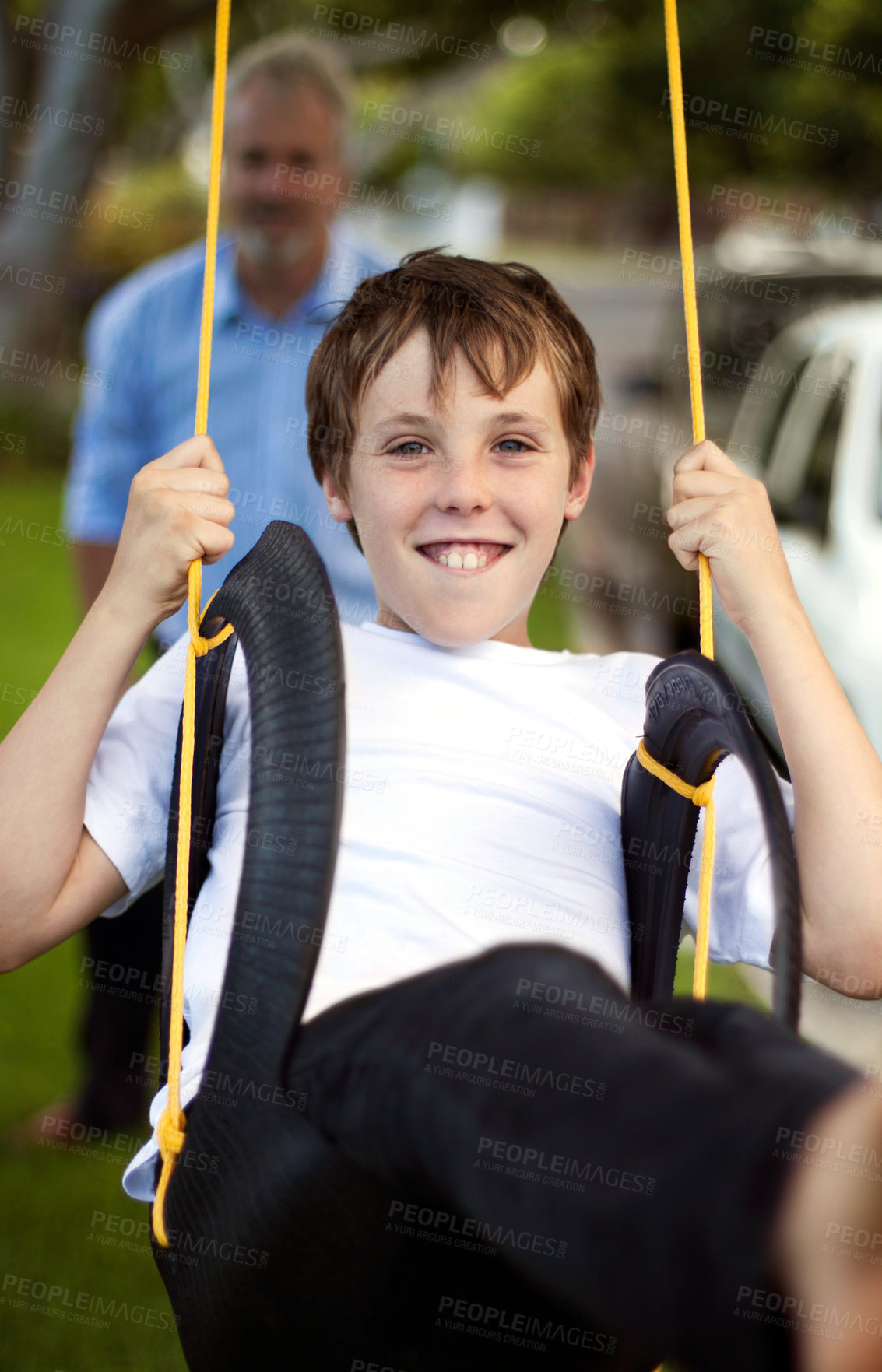 Buy stock photo Portrait, boy and swing at park with father for fun, childhood freedom and energy together. Happy young kid swinging with dad in garden, playground and outdoor for bonding, break and enjoy playing 