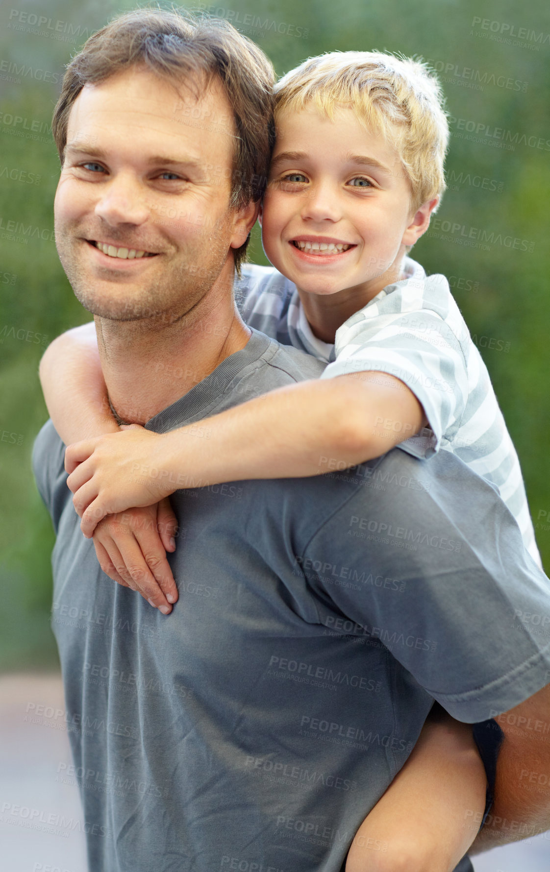 Buy stock photo Piggy back, portrait of father and son in garden, cute bonding together with care and love in backyard. Outdoor fun, support and dad holding playful child with smile, trust and happy man with kid.