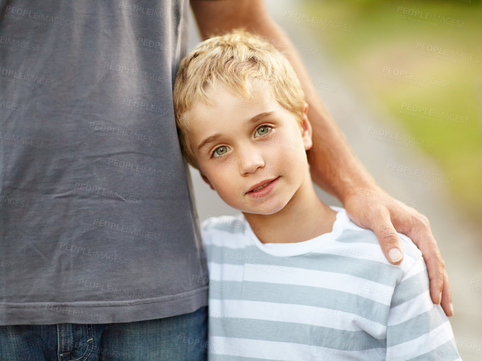 Buy stock photo A cute little boy with his father