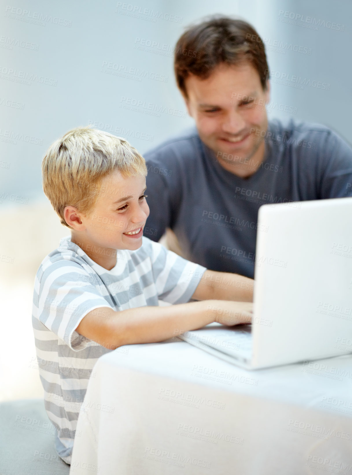 Buy stock photo Education, homeschool and laptop, happy man and child in backyard study, teaching and elearning. Online school, dad and kindergarten boy at table with computer, smile and website for virtual class.
