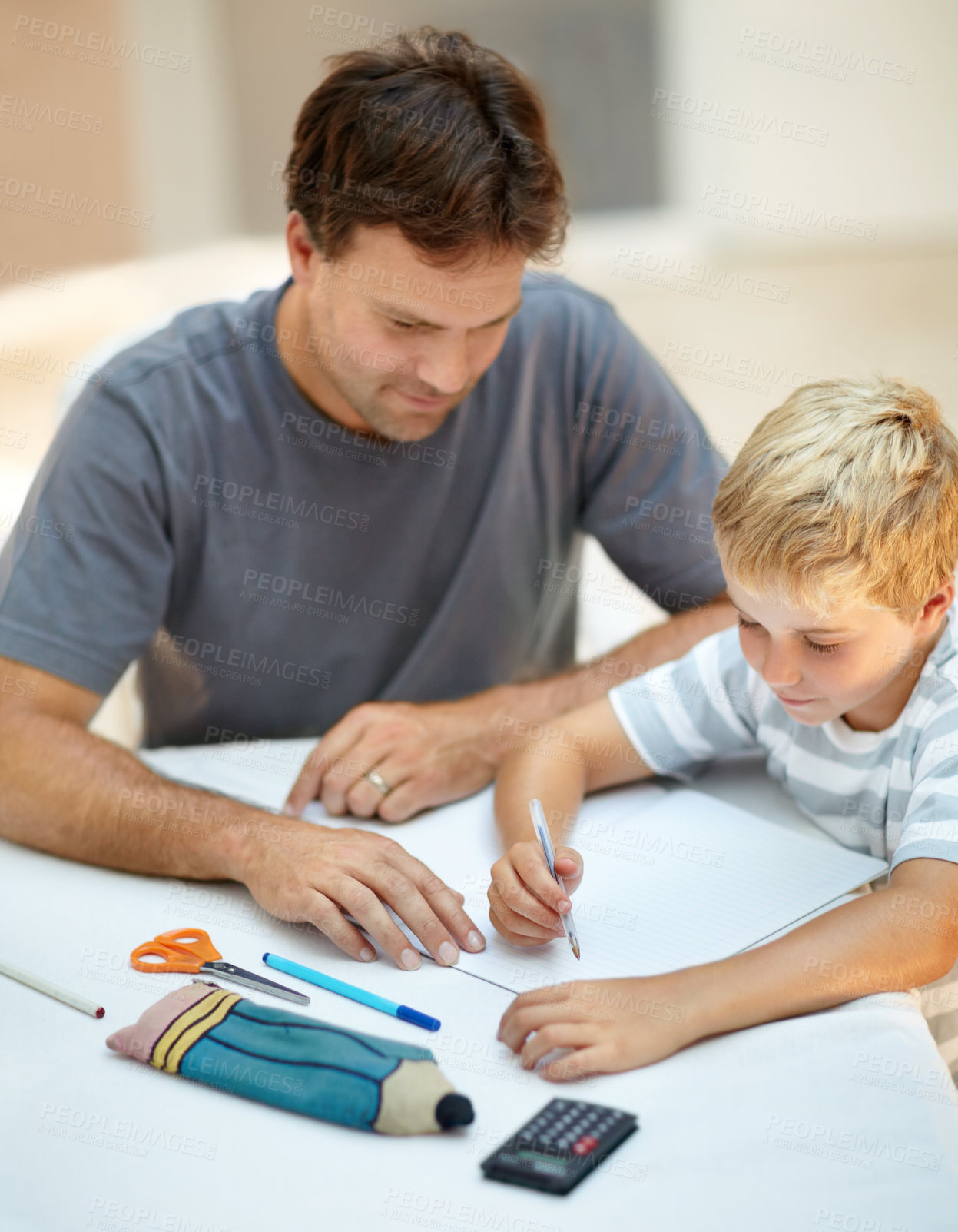 Buy stock photo Education, homework and man with child in backyard to study, teaching and learning math. Homeschool, dad and kindergarten boy at table with pen, paper and help with problem solving school project.