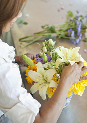 Buy stock photo Flowers, florist and hands of small business owner doing floral product, quality check or bouquet in a store or shop. Arrangement, plant and person or entrepreneur for sustainable market service