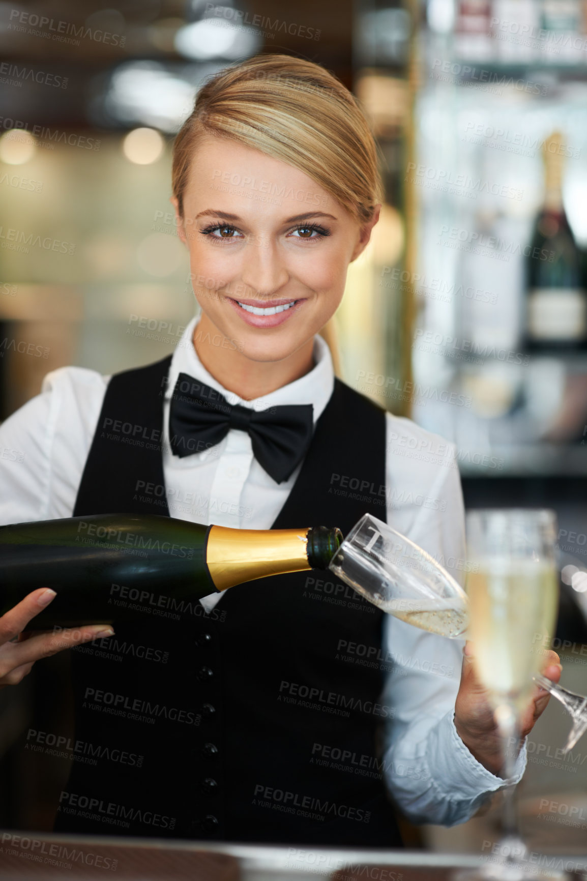 Buy stock photo Bartender woman, glass and champagne in portrait for drink service, help and luxury customer experience. Server, waiter and happy for pouring alcohol, smile or hospitality with sparkling wine in club