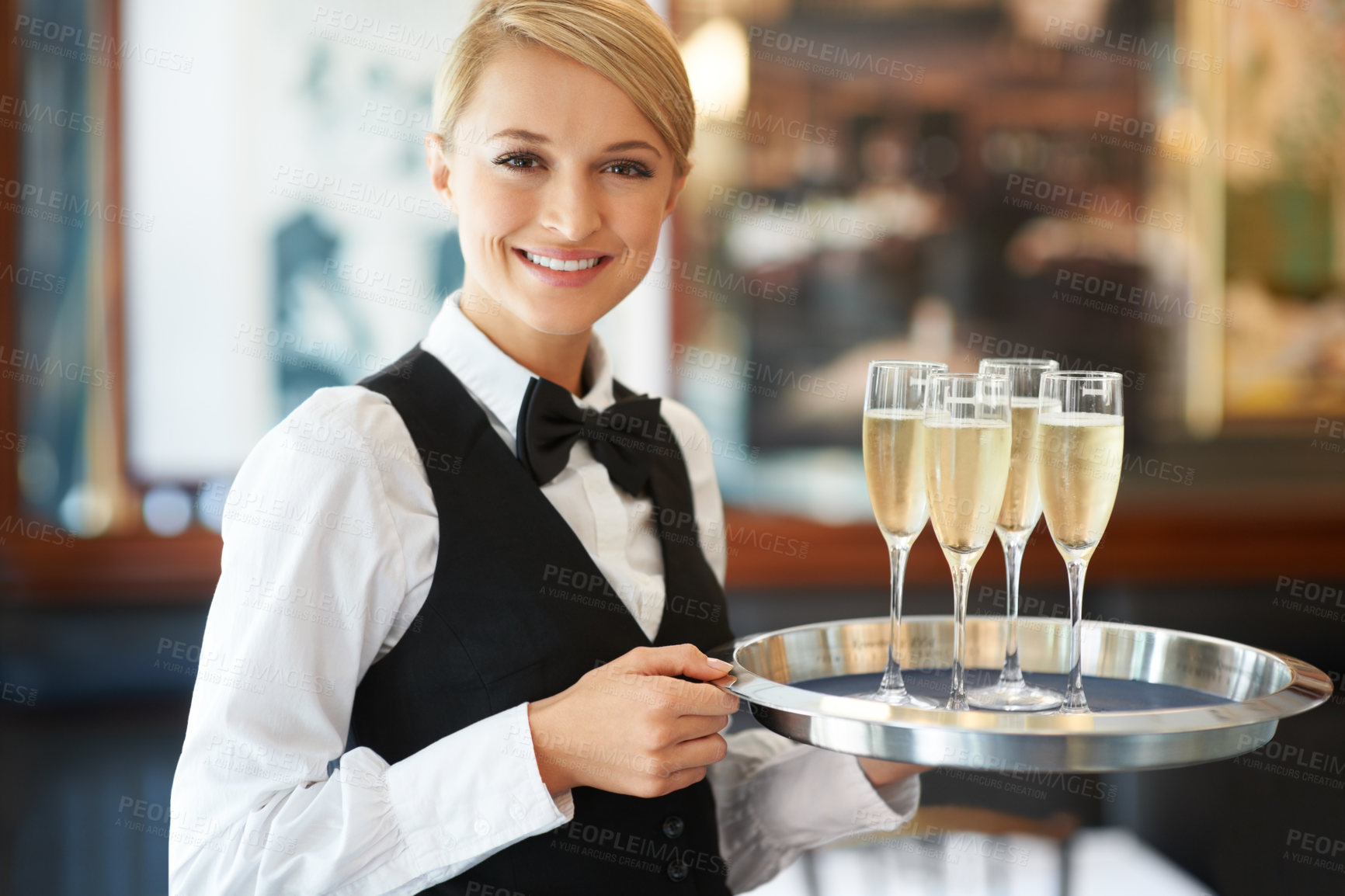Buy stock photo Bartender woman, tray and champagne in portrait for drink service, help and luxury customer experience. Server, waiter or girl with glasses, alcohol and smile with hospitality, catering or nightclub