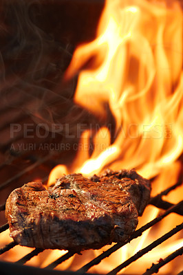 Buy stock photo Closeup of a tasty steak cooking on a fire