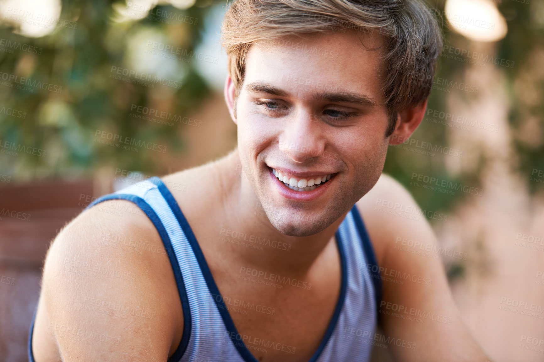 Buy stock photo Handsome young teen smiling while looking away