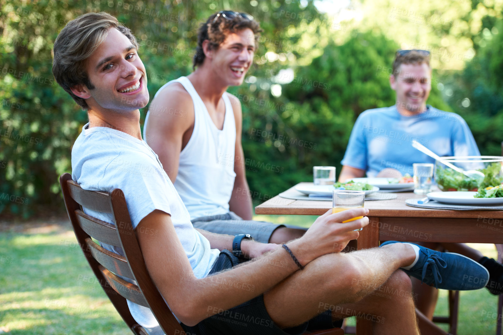 Buy stock photo Smiling young people at lunch with a group of friends - portrait