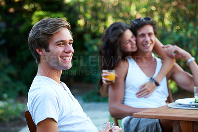 Buy stock photo Young man, laughing and friends in a backyard at home with bbq and happy event by a table. Group, teenager and lunch with people together in a summer in a garden with a smile and food for outdoor