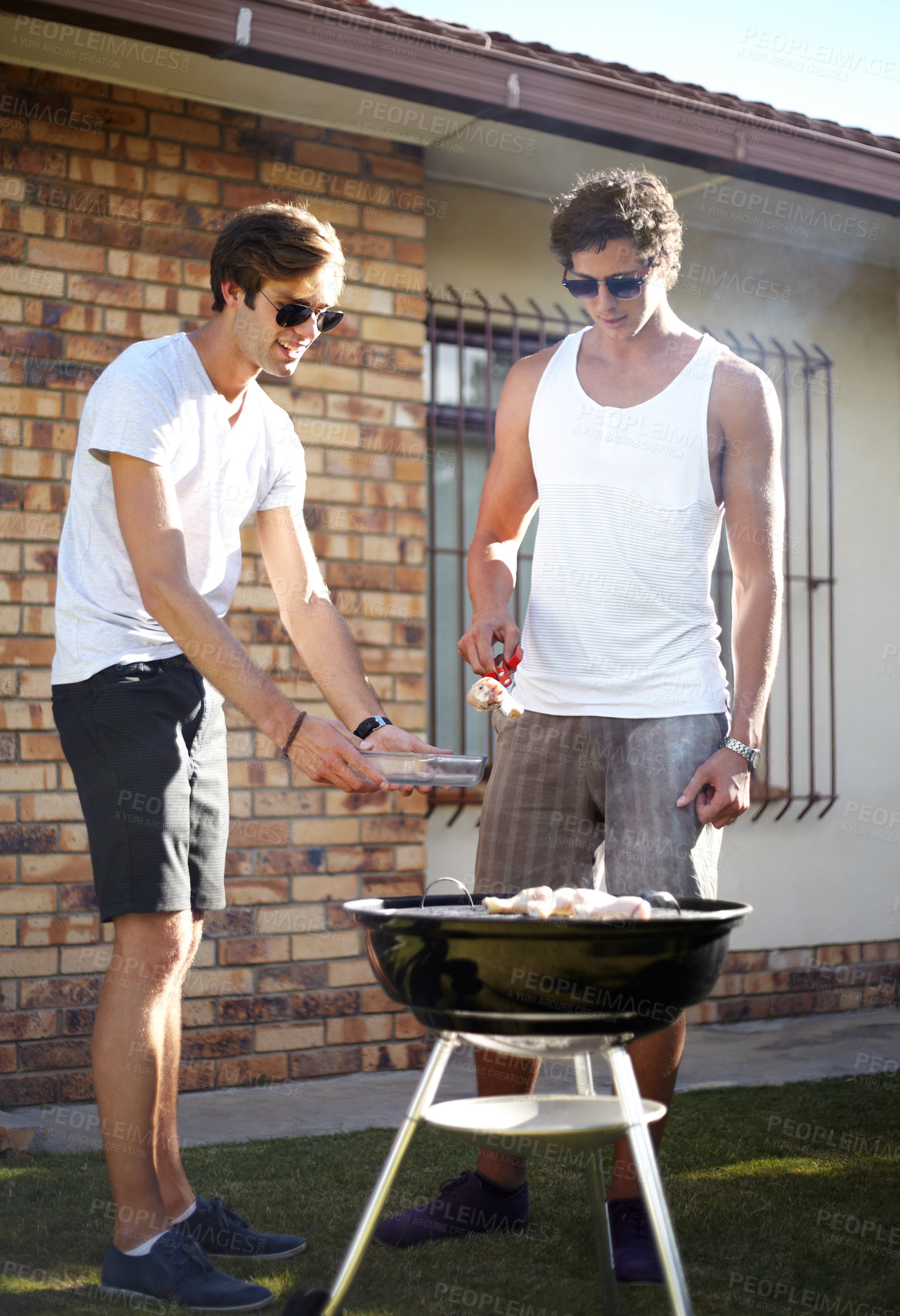 Buy stock photo Men, grill and meat season for BBQ in the backyard with cooking and lunch with friends. Garden, food and chat outdoor with young people together ready for eating with barbecue lunch in a yard