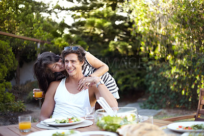 Buy stock photo Happy, couple and hug with food outdoor in backyard for bbq with love, care and support at home. Meal, woman and smile in garden with laughing and young people together with glass and date in summer