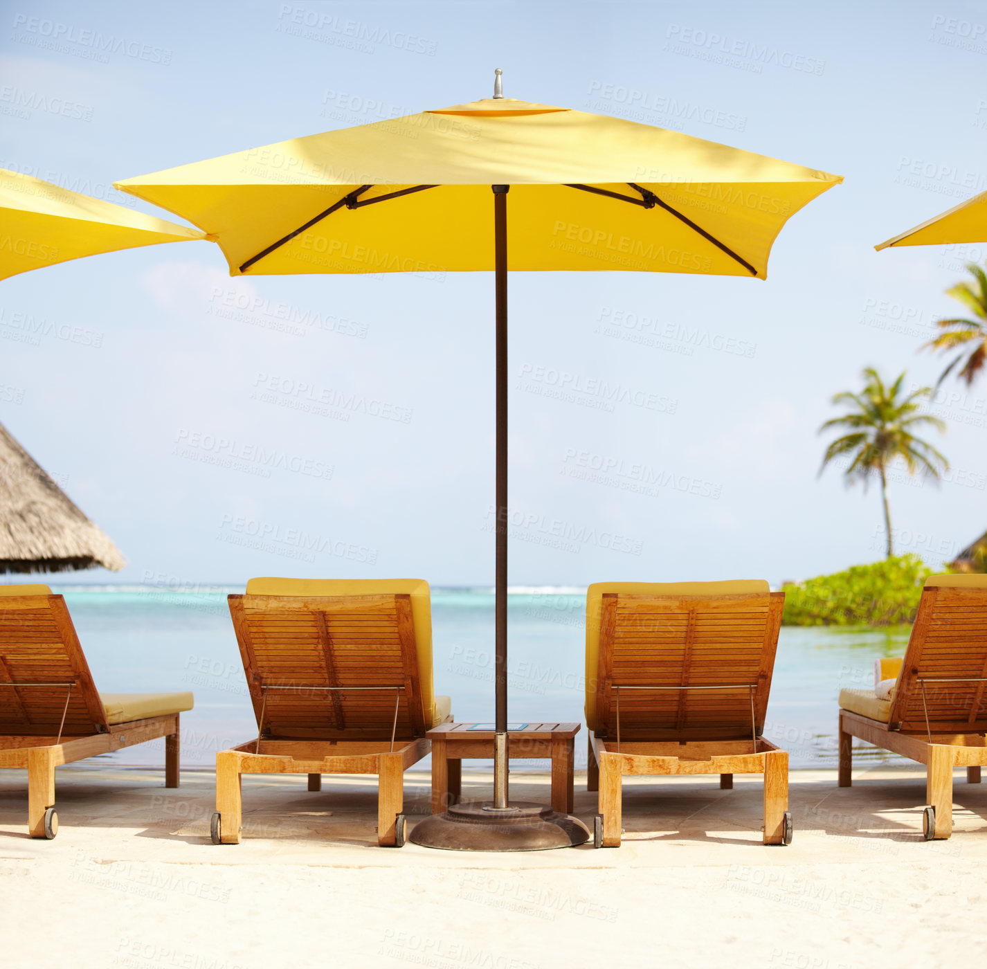 Buy stock photo Tropical, deck chairs and umbrella on beach for luxury, travel or summer villa for vacation or holiday. Maldives, leisure and ocean for resort, relax and island with sunshine, outdoor or caribbean 
