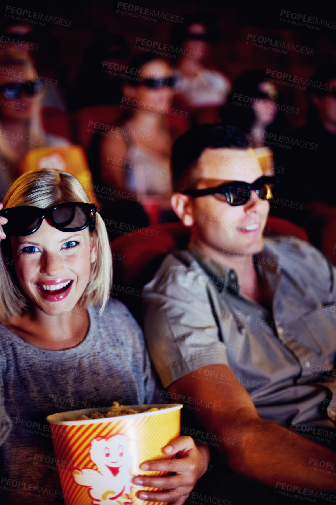 Buy stock photo 3d glasses, happy couple and popcorn, watching movie or eating on romantic date together. Cinema night, man and woman in film theater with snacks, eyewear and smile sitting in auditorium to relax.