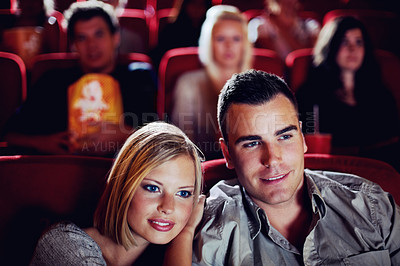 Buy stock photo Movie, smile and couple on date, watching film and love on romantic show together in audience. Cinema, man and woman in theater with romance, embrace and sitting in auditorium to relax at premier