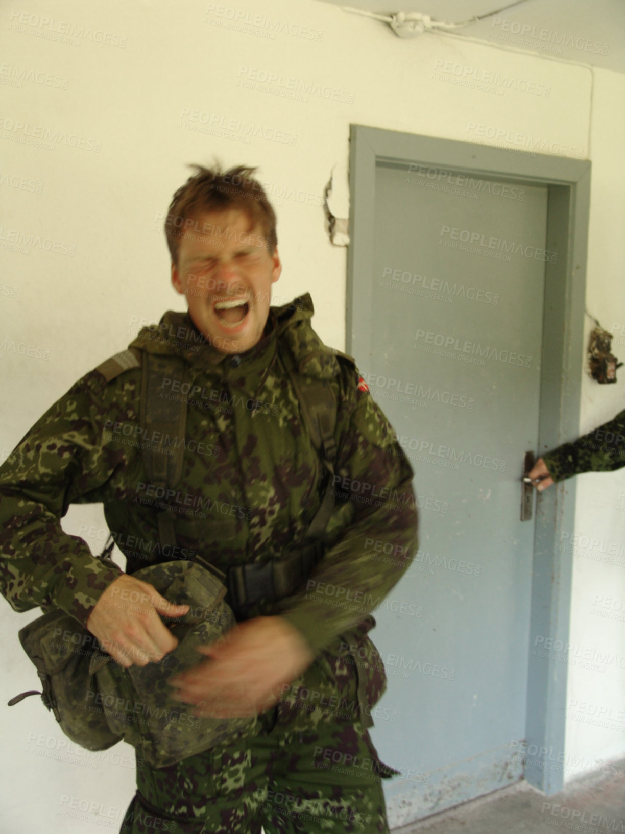 Buy stock photo Soldier screaming in war, exercise or training in military, opening door and apartment. Army, professional and man shouting at doorway for fight, danger and surprise attack of warrior in conflict