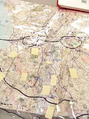 Buy stock photo Closeup of a tactical map for the military with markings and directions, used to strategise and plan from above. Marking off the enemy army troops and forces to launch attacks during a battle or war