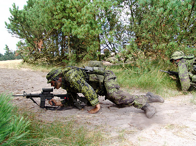 Buy stock photo Military, soldier and army with training in forest with camouflage for fitness, exercise or challenge outdoor with gear. People, service and hiding for mission or bootcamp with incognito for survival