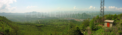 Buy stock photo Mountain, forest and banner of radio tower with blue sky for military operation, base or outdoor checkpoint in nature. Green hills, clouds or signal antenna by shelter for communication or rendezvous