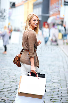 Buy stock photo City woman, fashion shopping and street walking with clothes and smile for customer sale, discount or deal with bokeh. Retail designer with gift paper bag in Europe urban lifestyle and happy portrait