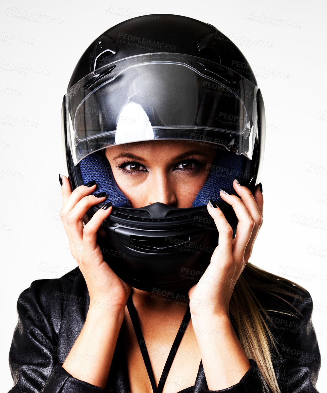 Buy stock photo Closeup, face and woman with motorbike helmet on a studio background with fashion or clothing. White backdrop, front and serious female rider with protection and safety accessory or gear for style
