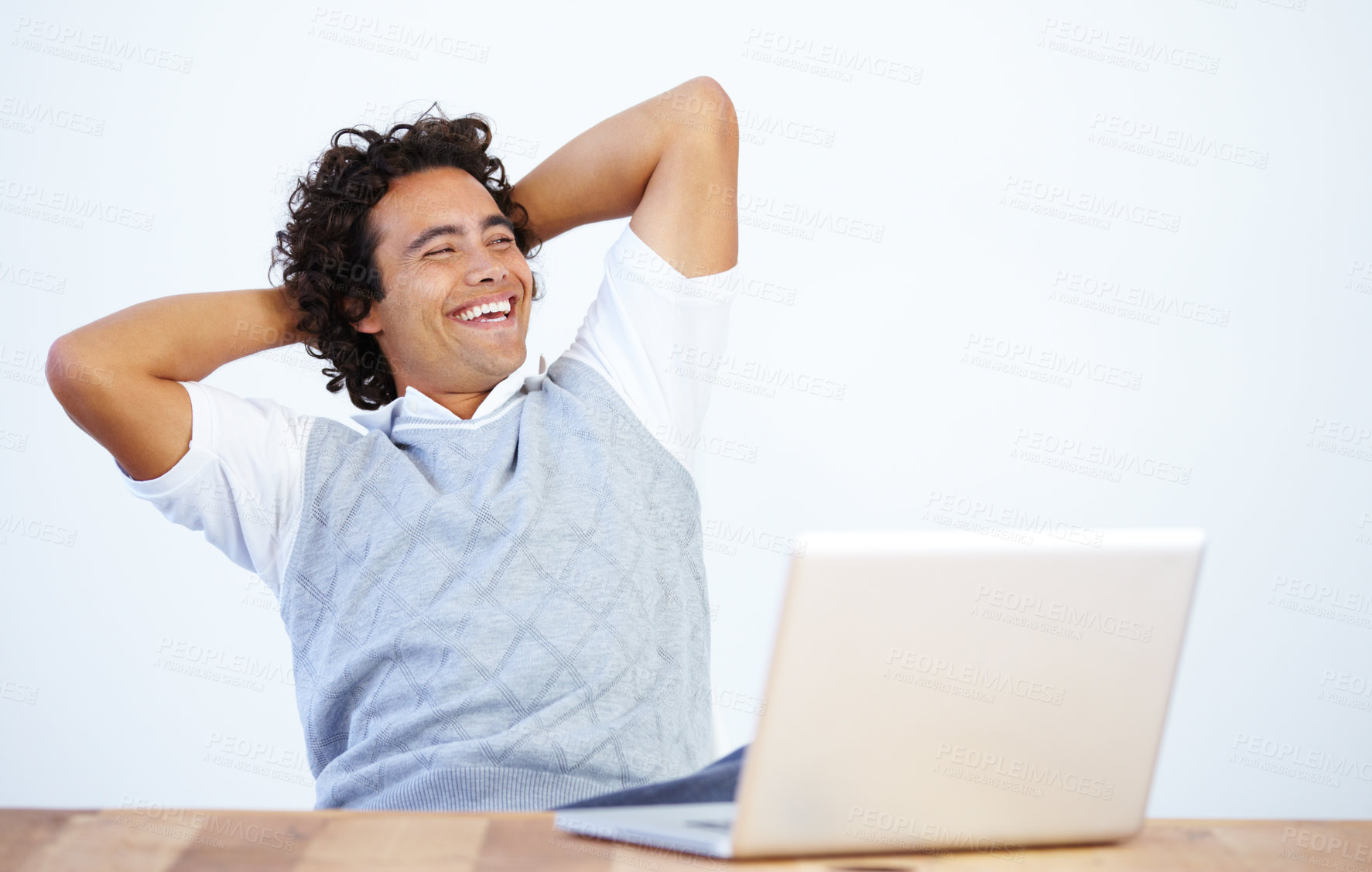 Buy stock photo Relax, laptop and businessman laughing after he complete a task isolated in a white background and an office desk. Calm, finish and male employee or worker smile and rest at work in a company