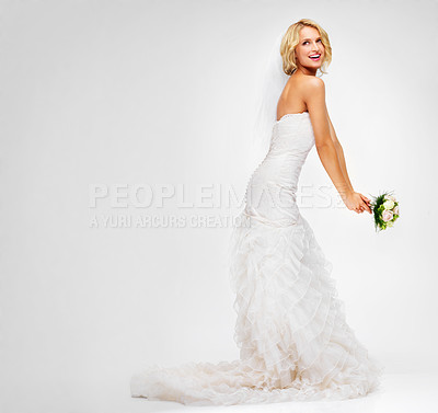 Buy stock photo Beauty, studio and woman bride with white background and flowers for wedding day glamour. Excited, happy and smile of girl in elegant fashion dress while holding bouquet for her special event. 