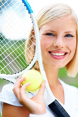 Buy stock photo Portrait of a young female tennis player holding a ball and racquet